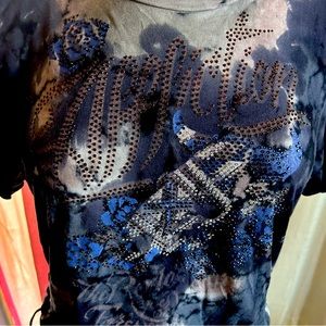 Affliction women’s, destroyed top with black embellishment, side ties. Sz medium